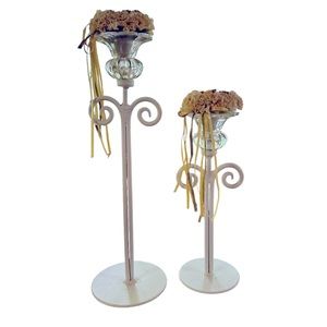 Two lovely white farmhouse candlesticks.